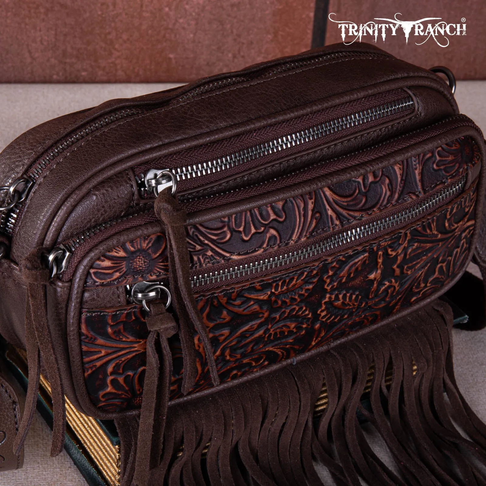 TR165-198  Trinity Ranch Floral Tooled Triple Zippered Pocket Fringe Belt Bag