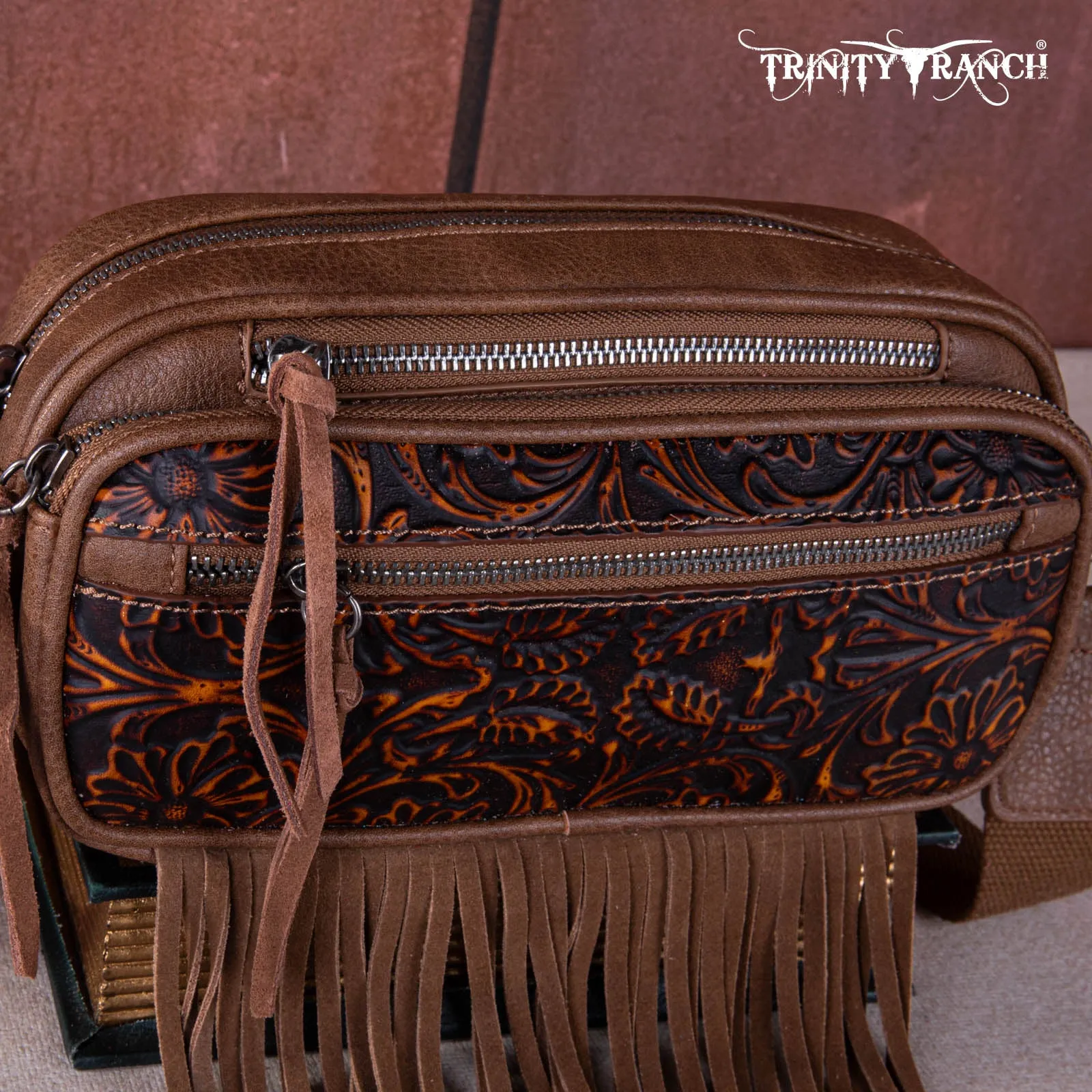 TR165-198  Trinity Ranch Floral Tooled Triple Zippered Pocket Fringe Belt Bag